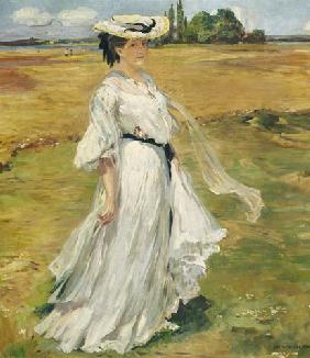 Woman in Lake Constance landscape.