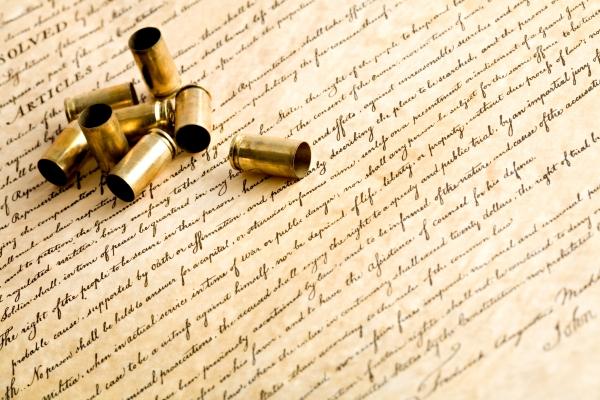 bullet casings on bill of rights from Sascha Burkard
