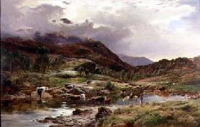 A Mountainous River Scene with Cattle in the Foreground