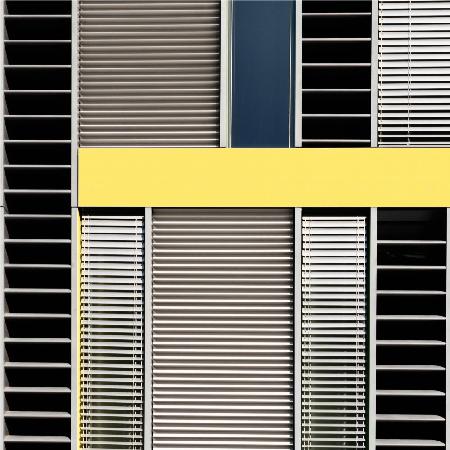 graphic facade with a yellow accent