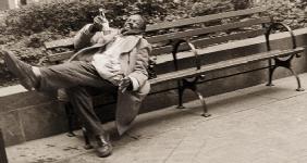 Drunk man on a park bench