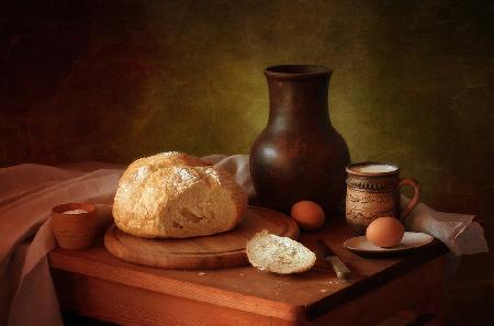 Still life with bread and milk